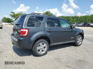 2008 Ford Escape XLT with VIN 1FMCU03178KA55787, listed as a Copart auction lot 64784465 with 2,235,503 mi miles and Clean title. Bid and sale history available at DreamBid. Image 3.