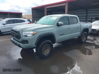 2022 Toyota Tacoma 4WD SR with VIN 3TYCZ5AN7NT065270, listed as a IAAI auction lot 41506454 with 13,097 mi miles. Bid and sale history available at carsss.com. Image 2.