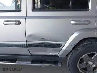 2008 Jeep Commander Sport with VIN 1J8HH48K58C143456, listed as a IAAI auction lot 41847541 with 163,209 mi miles. Bid and sale history available at carsss.com. Image 6.