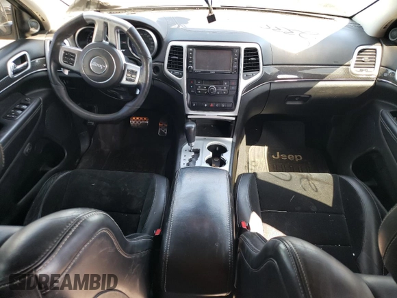 2012 Jeep Grand Cherokee SRT8 with VIN 1C4RJFDJ2CC352056, listed as a Copart auction lot 48810994 with 114,807 mi miles and Salvage Title. Bid and sale history available at carsss.com. Image 8.