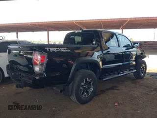 2021 Toyota Tacoma SR5 with VIN 5TFAZ5CN1MX111605, listed as a IAAI auction lot 42465381 with 67,307 mi miles and . Bid and sale history available at DreamBid. Image 4.