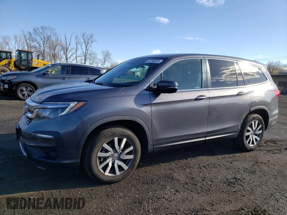 2022 Honda Pilot EX-L with VIN 5FNYF6H55NB023156, listed as a Copart auction lot 52269325 with 43,563 mi miles and Salvage title. Bid and sale history available at DreamBid. Image 1.