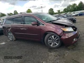 2015 Honda Odyssey Touring Elite with VIN 5FNRL5H98FB033336, listed as a Copart auction lot 57092355 with 186,046 mi miles and Salvage title. Bid and sale history available at DreamBid. Image 4.
