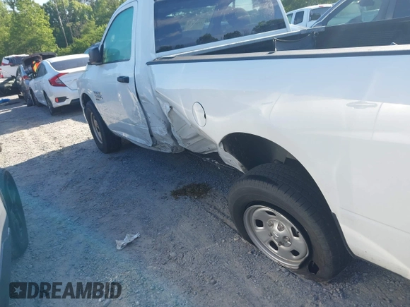 2022 Ram 1500 Tradesman with VIN 3C6JR6DG5NG412610, listed as a IAAI auction lot 42192125 with 31,341 mi miles and . Bid and sale history available at DreamBid. Image 6.