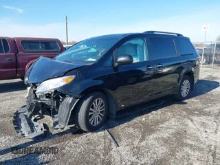 2016 Toyota Sienna XLE with VIN 5TDYK3DC3GS697173, listed as a IAAI auction lot 40899585 with 121,693 mi miles. Bid and sale history available at carsss.com. Image 2.