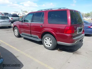 2004 Lincoln Navigator Luxury with VIN 5LMFU28R14LJ15068, listed as a IAAI auction lot 42078597 with 150,294 mi miles. Bid and sale history available at carsss.com. Image 3.