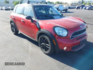 2016 MINI Countryman S with VIN WMWZC5C50GWU02754, listed as a IAAI auction lot 42702055 with 105,284 mi miles and . Bid and sale history available at DreamBid. Image 1.