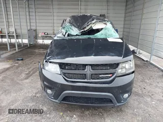 2015 Dodge Journey R/T with VIN 3C4PDDEG3FT555035, listed as a IAAI auction lot 41067936 with 214,244 mi miles and . Bid and sale history available at DreamBid. Image 12.