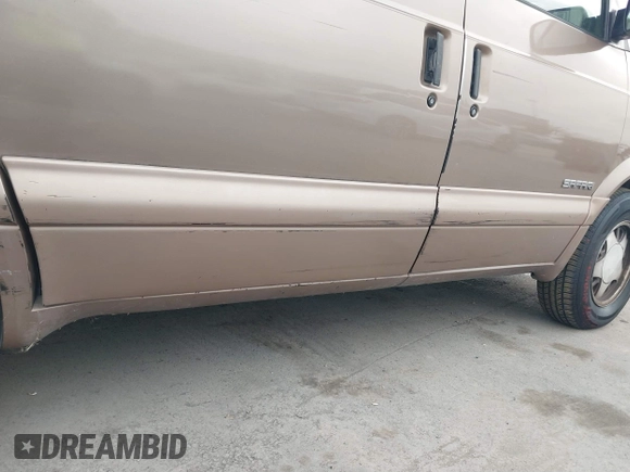 1996 GMC Safari z VIN 1GKDM19W3TB533427, wystawiony jako IAAI lot #38894124 z przebiegiem 261 801 mil mil oraz . Historia ofert i sprzedaży dostępna na DreamBid. Obrazek 6.