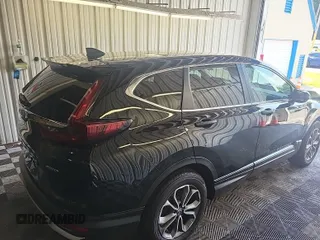 2021 Honda CR-V EX with VIN 2HKRW2H57MH642743, listed as a IAAI auction lot 42832414 with 58,006 mi miles and . Bid and sale history available at DreamBid. Image 3.