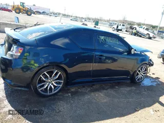 2016 Scion tC with VIN JTKJF5C71GJ020893, listed as a IAAI auction lot 41891029 with 76,341 mi miles. Bid and sale history available at carsss.com. Image 14.