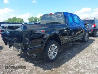 2018 Ford F-150 XL with VIN 1FTEX1EP5JKG01004, listed as a IAAI auction lot 42583232 with 123,258 mi miles and . Bid and sale history available at DreamBid. Image 4.