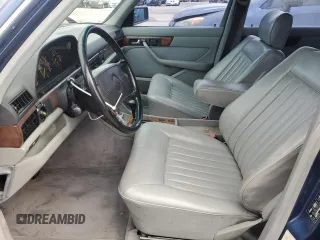 1986 Mercedes-Benz 560 with VIN WDBCA39D0GA267806, listed as a Copart auction lot 49870225 with 117,401 mi miles and Clean Title. Bid and sale history available at DreamBid. Image 7.