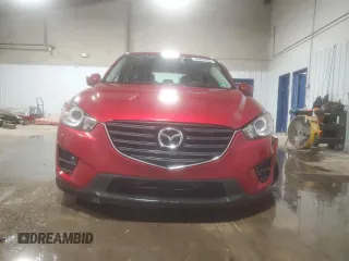 2016 Mazda CX-5 Sport with VIN JM3KE4BY4G0844967, listed as a Copart auction lot 54829885 with 95,653 mi miles and Salvage title. Bid and sale history available at DreamBid. Image 5.