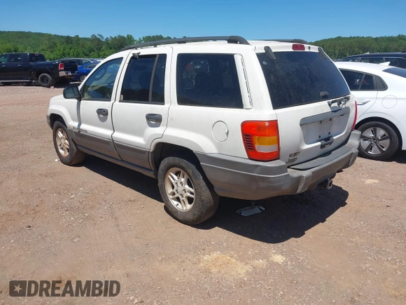 2002 Jeep Grand Cherokee Laredo with VIN 1J4GX48S32C134911, listed as a IAAI auction lot 42323138 with 156,852 mi miles and . Bid and sale history available at DreamBid. Image 3.
