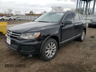 2012 Volkswagen Touareg Sport z VIN WVGFF9BP4CD005282, wystawiony jako Copart lot #53793075 z przebiegiem 116 098 mil mil oraz Szkody całkowita. Historia ofert i sprzedaży dostępna na DreamBid. Obrazek 1.