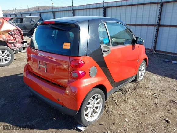 2008 Smart fortwo Pure with VIN WMEEJ31X28K122571, listed as a IAAI auction lot 41680541 with 63,673 mi miles. Bid and sale history available at carsss.com. Image 4.