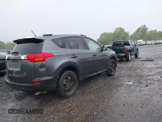 2014 Toyota RAV4 LE with VIN JTMBFREVXED094789, listed as a IAAI auction lot 42275824 with 524,326 mi miles and . Bid and sale history available at DreamBid. Image 4.
