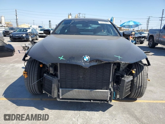2021 BMW 5 Series 540i with VIN WBA53BJ05MWW92487, listed as a Copart auction lot 57679975 with 53,311 mi miles and Salvage title. Bid and sale history available at DreamBid. Image 5.