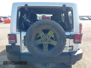 2012 Jeep Wrangler Unlimited Sahara with VIN 1C4HJWEG9CL146750, listed as a IAAI auction lot 41512678 with 94,952 mi miles. Bid and sale history available at carsss.com. Image 6.