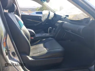 2003 Infiniti G35 w/Leather with VIN JNKCV51E43M308273, listed as a IAAI auction lot 42194344 with 180,533 mi miles. Bid and sale history available at carsss.com. Image 5.