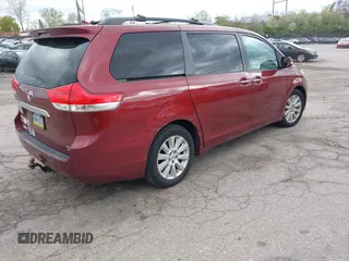 2013 Toyota Sienna XLE with VIN 5TDDK3DC1DS052600, listed as a IAAI auction lot 42055747 with 187,615 mi miles and . Bid and sale history available at DreamBid. Image 4.
