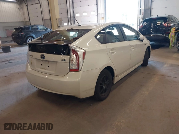 2015 Toyota Prius Four z VIN JTDKN3DU2F0470886, wystawiony jako IAAI lot #42157691 z przebiegiem 108 400 mil mil oraz . Historia ofert i sprzedaży dostępna na DreamBid. Obrazek 4.