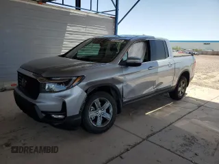 2023 Honda Ridgeline RTL z VIN 5FPYK3F55PB046041, wystawiony jako Copart lot #57072445 z przebiegiem 30 621 mil mil oraz Szkoda całkowita • Salvage title. Historia ofert i sprzedaży dostępna na DreamBid. Obrazek 1.