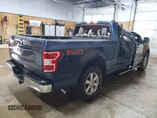 2018 Ford F-150 XL with VIN 1FTFX1E57JFE75983, listed as a Copart auction lot 52619685 with 184,124 mi miles and Clean title. Bid and sale history available at DreamBid. Image 3.