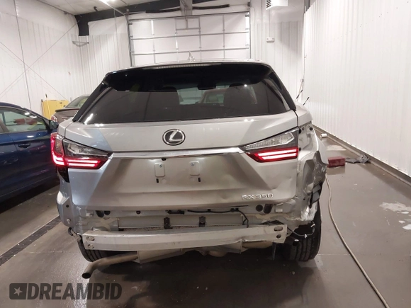 2018 Lexus RX 350 with VIN 2T2BZMCA7JC163886, listed as a IAAI auction lot 42248863 with 57,319 mi miles and . Bid and sale history available at DreamBid. Image 17.
