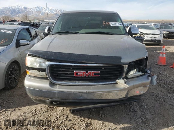 2000 GMC New Sierra 1500 SLE with VIN 2GTEK19T7Y1310097, listed as a Copart auction lot 84557764 with 257,060 mi miles and Salvage Title. Bid and sale history available at carsss.com. Image 5.