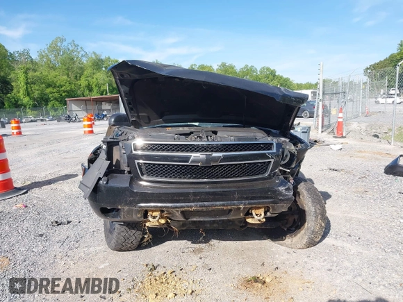 2013 Chevrolet Tahoe Commercial with VIN 1GNLC2E00DR265941, listed as a IAAI auction lot 42289977 with 206,840 mi miles and . Bid and sale history available at DreamBid. Image 11.