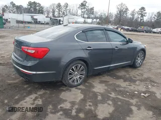 2014 Kia Cadenza Premium with VIN KNALN4D70E5139369, listed as a IAAI auction lot 41416910 with 174,118 mi miles. Bid and sale history available at carsss.com. Image 4.