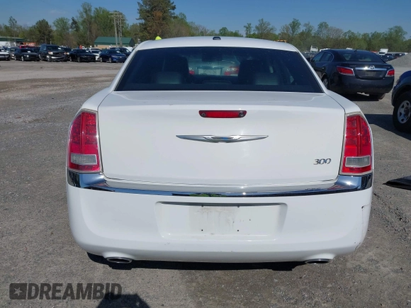 2012 Chrysler 300 Limited with VIN 2C3CCACG4CH250588, listed as a IAAI auction lot 41943257 with 236,242 mi miles and . Bid and sale history available at DreamBid. Image 16.