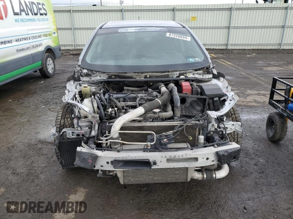 2014 Mitsubishi Lancer Evolution GSR z VIN JA32W8FVXEU000210, wystawiony jako Copart lot #87228694 z przebiegiem 120 356 mil mil oraz Szkody całkowita. Historia ofert i sprzedaży dostępna na DreamBid. Obrazek 5.