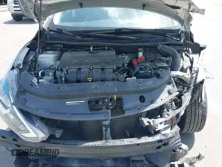 2019 Nissan Sentra S z VIN 3N1AB7AP6KY205658, wystawiony jako IAAI lot #42151392 z przebiegiem 80 395 mil mil oraz . Historia ofert i sprzedaży dostępna na DreamBid. Obrazek 10.