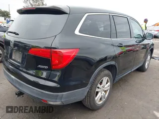 2016 Honda Pilot LX with VIN 5FNYF6H18GB063909, listed as a IAAI auction lot 41778361 with 110,655 mi miles. Bid and sale history available at carsss.com. Image 4.