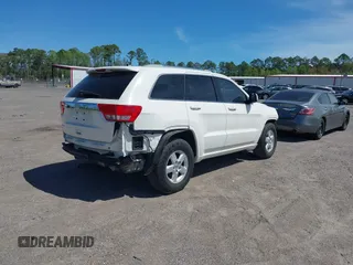 2011 Jeep Grand Cherokee Laredo with VIN 1J4RS4GG0BC573388, listed as a IAAI auction lot 41875998 with Not Provided miles and . Bid and sale history available at DreamBid. Image 4.