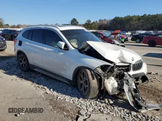 2019 BMW X1 sDrive28i with VIN WBXHU7C53K3H45694, listed as a Copart auction lot 85804084 with 151,645 mi miles and Salvage Title. Bid and sale history available at DreamBid. Image 4.