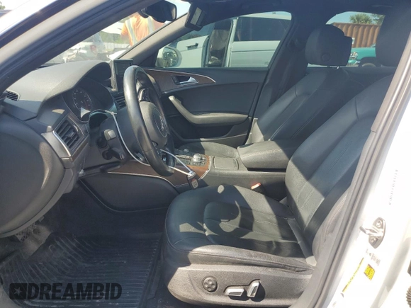 2016 Audi A6 Premium with VIN WAUFFAFCXGN186074, listed as a Copart auction lot 56920015 with 124,382 mi miles and Salvage title. Bid and sale history available at DreamBid. Image 7.