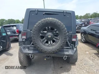 2012 Jeep Wrangler Unlimited Sport with VIN 1C4BJWDG3CL200826, listed as a IAAI auction lot 42261113 with 135,554 mi miles and . Bid and sale history available at DreamBid. Image 17.