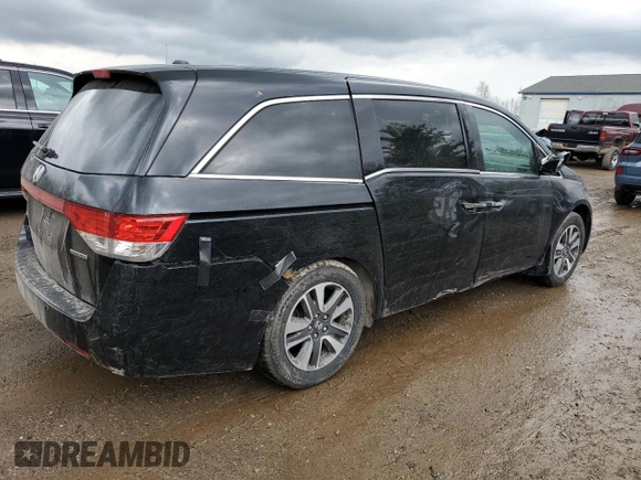 2014 Honda Odyssey Touring z VIN 5FNRL5H97EB508649, wystawiony jako Copart lot #55665245 z przebiegiem 162 892 mil mil oraz Czysty tytuł • Clean title. Historia ofert i sprzedaży dostępna na DreamBid. Obrazek 3.