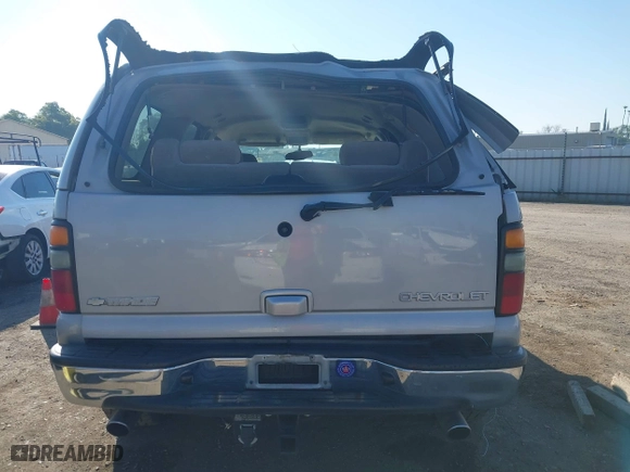 2004 Chevrolet Tahoe LS with VIN 1GNEC13T64J282970, listed as a IAAI auction lot 41879458 with 205,952 mi miles. Bid and sale history available at carsss.com. Image 16.