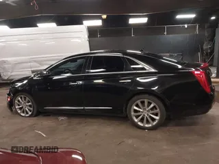 2013 Cadillac XTS Luxury z VIN 2G61R5S34D9102625, wystawiony jako IAAI lot #41668752 z przebiegiem 112 065 mil mil oraz . Historia ofert i sprzedaży dostępna na DreamBid. Obrazek 14.