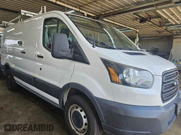2015 Ford Transit Cargo z VIN 1FTNR1ZM8FKA55185, wystawiony jako IAAI lot #42515954 z przebiegiem 86 918 mil mil oraz . Historia ofert i sprzedaży dostępna na DreamBid. Obrazek 26.