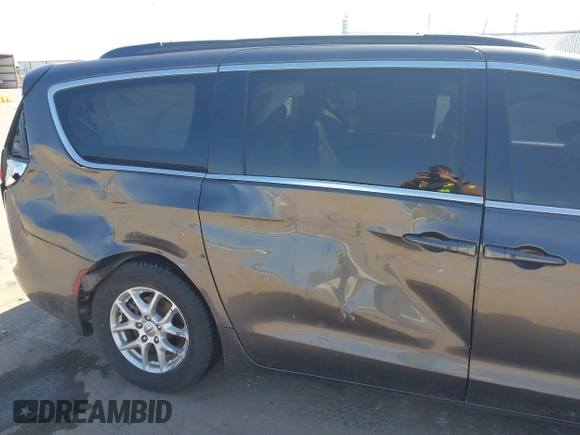2021 Chrysler Voyager LXi with VIN 2C4RC1DGXMR519600, listed as a IAAI auction lot 41813991 with 87,187 mi miles and . Bid and sale history available at DreamBid. Image 18.