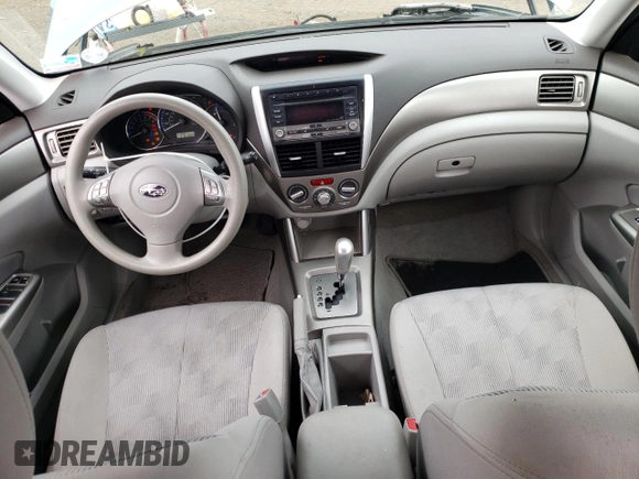 2010 Subaru Forester X Premium with VIN JF2SH6CCXAH736488, listed as a Copart auction lot 61040815 with 61,823 mi miles and Salvage title. Bid and sale history available at DreamBid. Image 8.