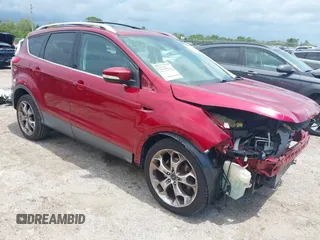 2013 Ford Escape Titanium z VIN 1FMCU0J96DUC67636, wystawiony jako IAAI lot #42539425 z przebiegiem 120 593 mil mil oraz . Historia ofert i sprzedaży dostępna na DreamBid. Obrazek 1.