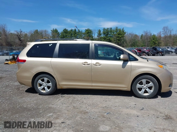 2012 Toyota Sienna LE AAS with VIN 5TDKK3DC9CS184090, listed as a IAAI auction lot 42123891 with 162,065 mi miles. Bid and sale history available at carsss.com. Image 13.