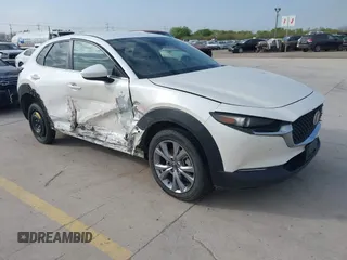 2021 Mazda CX-30 Select with VIN 3MVDMABL1MM248505, listed as a IAAI auction lot 41848945 with 89,046 mi miles and . Bid and sale history available at DreamBid. Image 1.